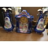 A Radfordian Crown Art Ware Antique porcelain mantel clock garniture. Vase does have damage.