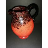 Rare Monart red and black coloration jug 6 inches in height.