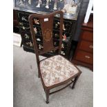 Stunning Edwardian chair with flower design upholstery.