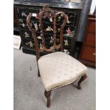 Stunning victorian parlour chair with yellow silk upholstery.