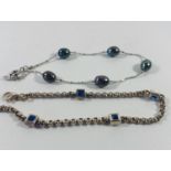 2 silver bracelets , cultured pearls and blue stones. 8.67 gr