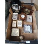 Box of collectable clocks.