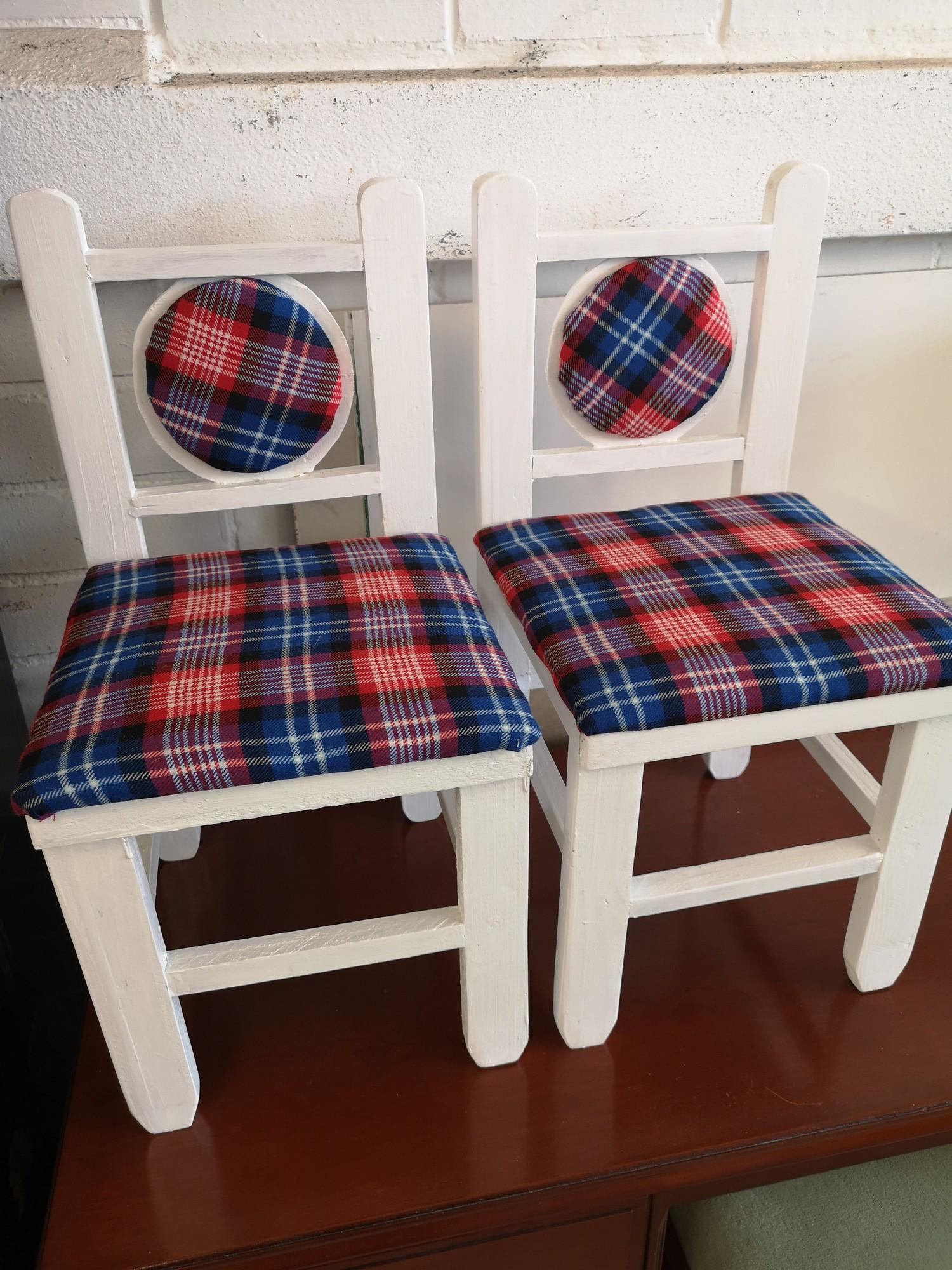Pair of tartan upholstered child's chairs.