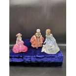 3 royal doulton figures.