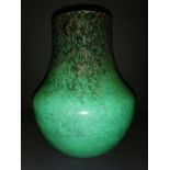 Scottish glass Monart vase with green, black with gold flake adverturine shape is fb 10 inches in