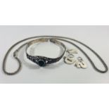 Silver 925 Bangle together with necklace charms . 24.97 grams.