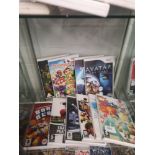 Shelf of ninetendo wii games.