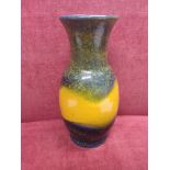 Rare Germany pottery retro vase stands 10 inches in height.