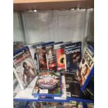 Shelf of PlayStation 2 games.