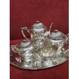 5 piece Silver art deco tea set with matching tray in the art nouveau design. 2. 9 kilos.