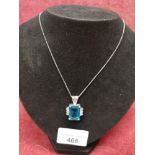Stunning silver necklace set in light blue stone.