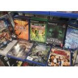 Shelf of PlayStation 2 games.