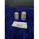 2 silver Hall marked thimbles.