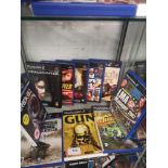 Shelf of PlayStation 2 games.