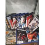 Shelf of PlayStation 2 games.