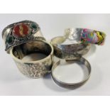 Lot of non magnetic silver metal bangles.