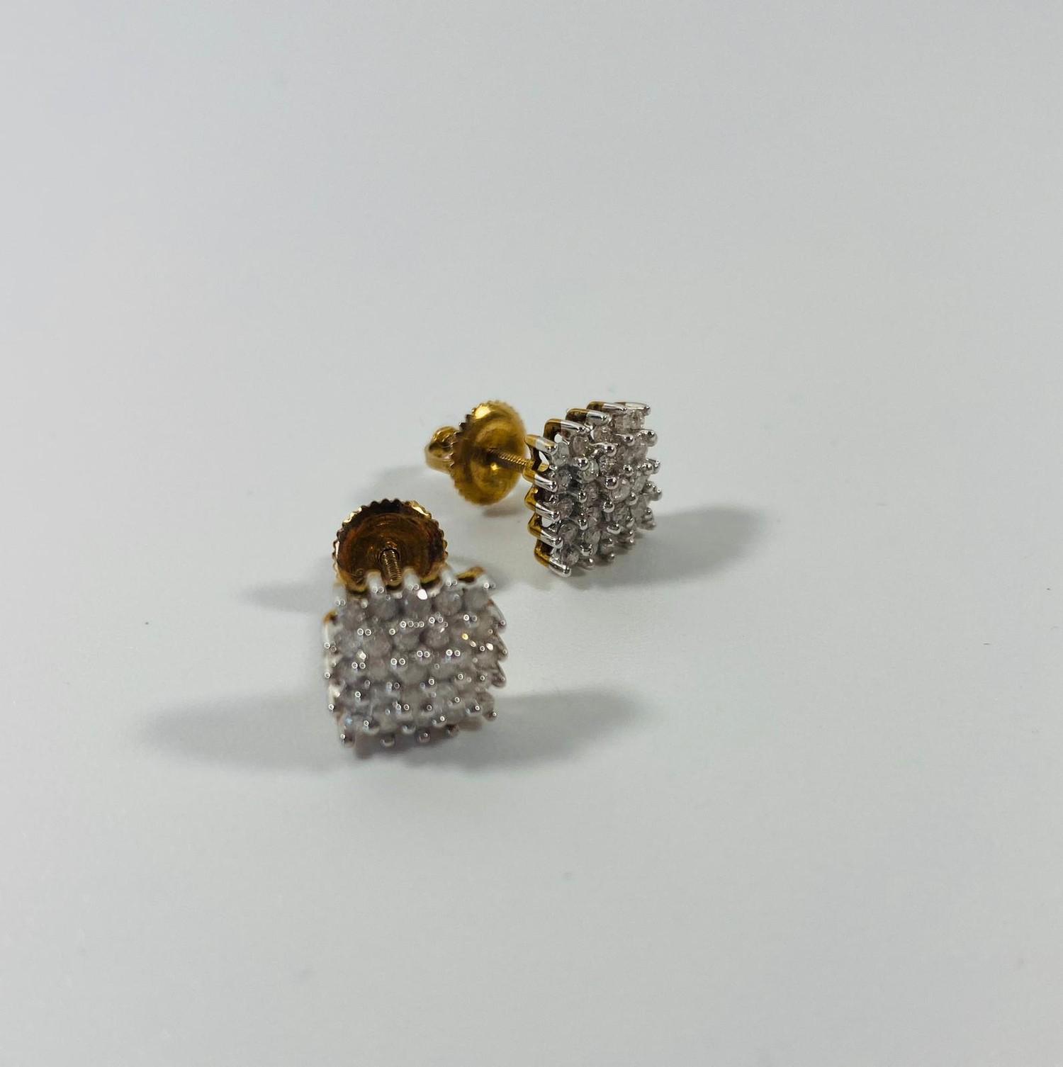 Pair of 9ct gold diamond earrings. 2 grams.