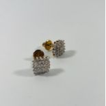 Pair of 9ct gold diamond earrings. 2 grams.