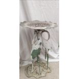 Cast iron bird bath with 3 heron supports.