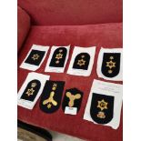 Set of 8 miltary golden coloured epilets.