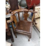 Georgian 1800s corner chair with leather upholstery.