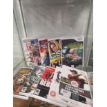 Shelf of Nintendo wii games.