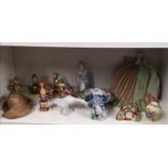 Shelf of collectables to include hummel, wade Tom figure victorian doll etc.