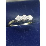 18ct gold 3 stone diamond engagement ring.