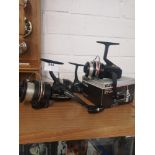 3 fishing reels.