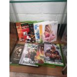 Shelf of xbox and wii games.