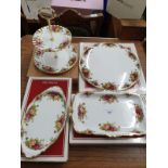 Lot of boxed Royal Albert cake plates.