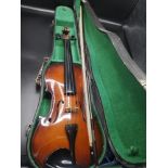 Parot violin with bow and casing.