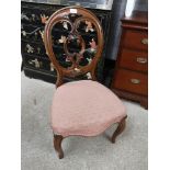 Stunning victorian parlour chair with pink silk upholstery.