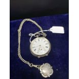 Silver Hall marked pocket watch with Albert chain and silver Hall marked fob.