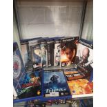 Shelf of PlayStation 2 games.