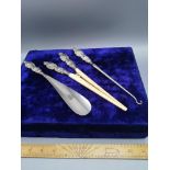 Matching set of silver hall marked Birmingham glove stretchers , button hook and shoe horn makers