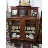 Large Edwardian inlaid dresser with 2 glass fronted doors with mirror back.