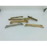 Lot of Swalk tie pins etc.