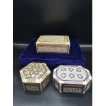 3 inlaid boxes.