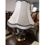 Large ornate table lamp with design.