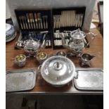 Shelf of quality silver plated wares.