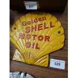 Cast iron shell advertising plaques.