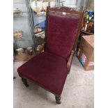 Stunning victorian gentlemans chair set in purple upholstery.
