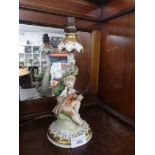 1900s Italian table lamp with boy holding bird marked N with a crown Italy.