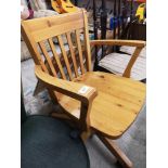 Pine captain s chair.