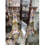 Pair of majolica candle sticks as found .
