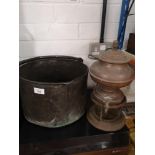 Antique coal bin together with copper urn on stand with tap.