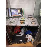 Nintendo 64 console with 4 controllers and 8 games.
