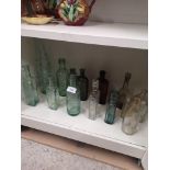 Collection of 1900s glass bottles.