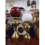 2 brass oil lamp with globe covers etc.